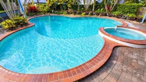 Renovated Brisbane swimming pool with updated finishes, showing how an old pool can be improved without full rebuilding.