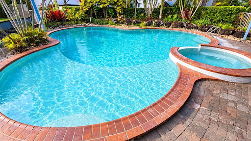 Renovated Brisbane swimming pool with updated finishes, showing how an old pool can be improved without full rebuilding.