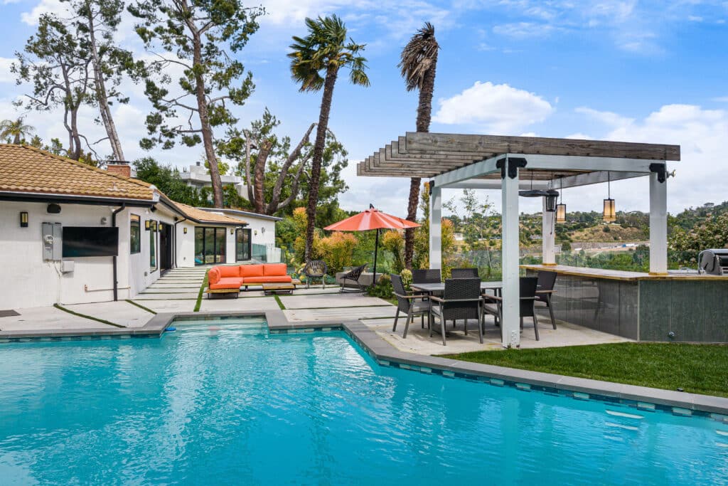 modern suburban home with a pool and lounge area 2026 03 18 16 17 27 utc